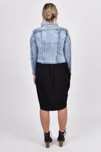 Load image into Gallery viewer, Our Frayed Denim Jacket is perfect for all seasons, made of soft and stretchy denim with a cropped hem for easy layering and all-year wear. The jacket is super stylish with a frayed hem and washed appearance, yet functional with breast and hip pockets, and a split cuff for adjusting the sleeve length. PQ Collection. Back of jacket
