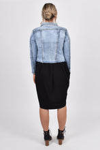 Load image into Gallery viewer, Our Frayed Denim Jacket is perfect for all seasons, made of soft and stretchy denim with a cropped hem for easy layering and all-year wear. The jacket is super stylish with a frayed hem and washed appearance, yet functional with breast and hip pockets, and a split cuff for adjusting the sleeve length. PQ Collection. Back of jacket